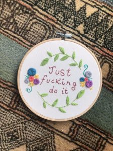 embroidered circle saying just fucking do it